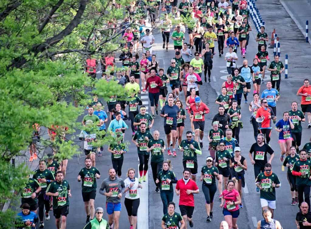 People running on street during daytime